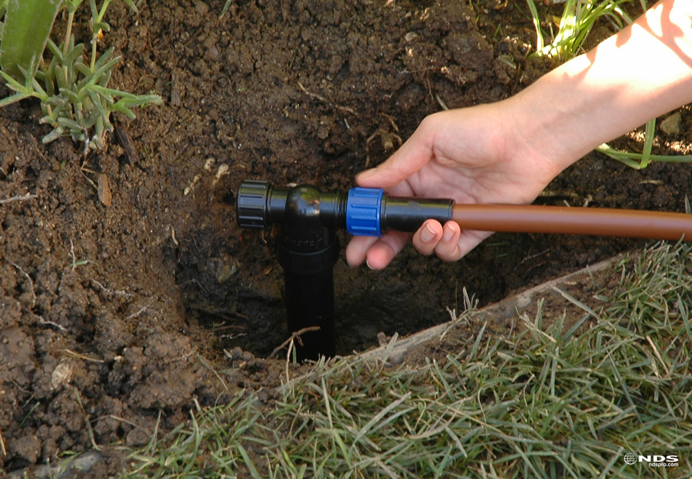 Spray to drip converted with tubing attached